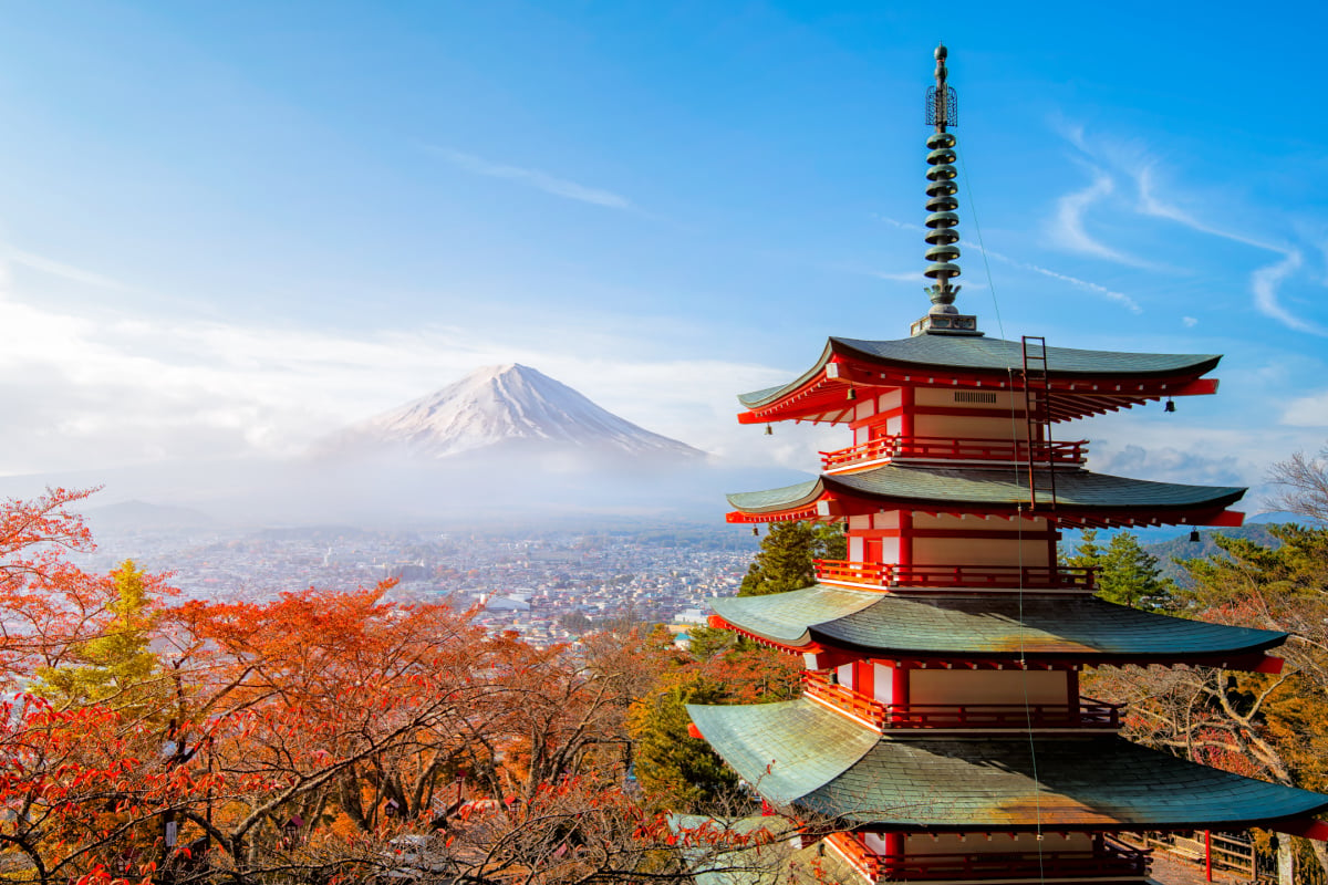 Mt. Fuji viewed from behind red Chureito Pagoda in autumn fall colors, Fujiyoshida, Japan