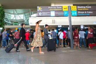 Bali airport officials are encouraging tourists to use electronic customs declarations to avoid crowds