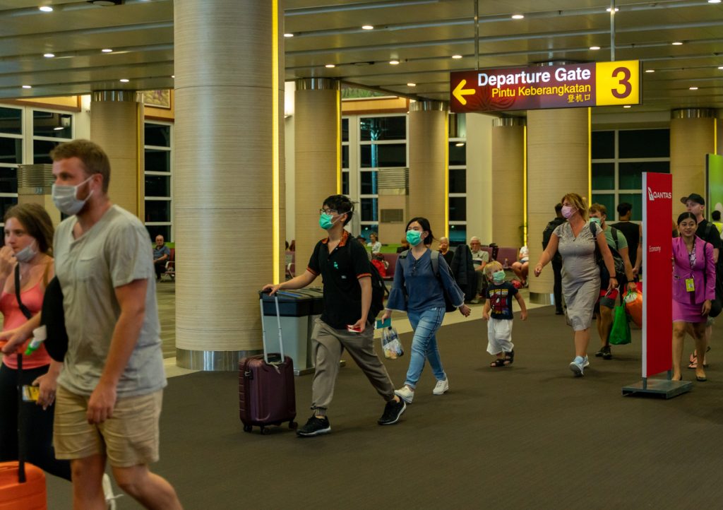 Bali Airport Passengers Urged To Comply With Health Protocols As Covid Cases Surge Again