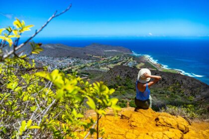 female traveler at amazing lookout point on oahu island in hawaii