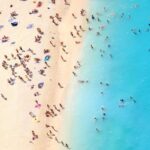 Aerial view of tourists on a beach in Greece