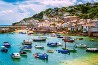 Breathtaking beaches and picture-postcard villages: why summer is the perfect time to visit this British destination
