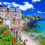 Be about Mallorca! This beautiful beach city offers cheaper prices and old culture
