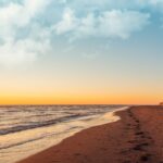 This Canadian island with red sandy beaches breaks all tourist records