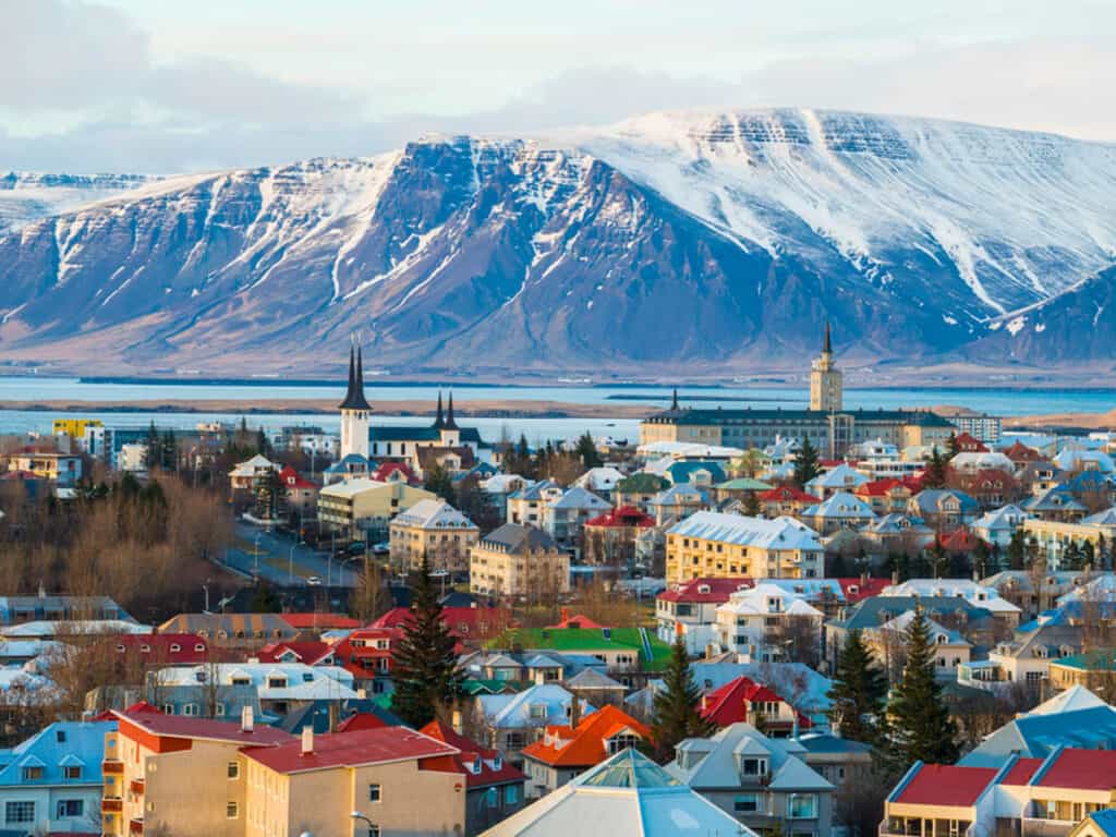 View of Reykjavik city with snowcapped mountains