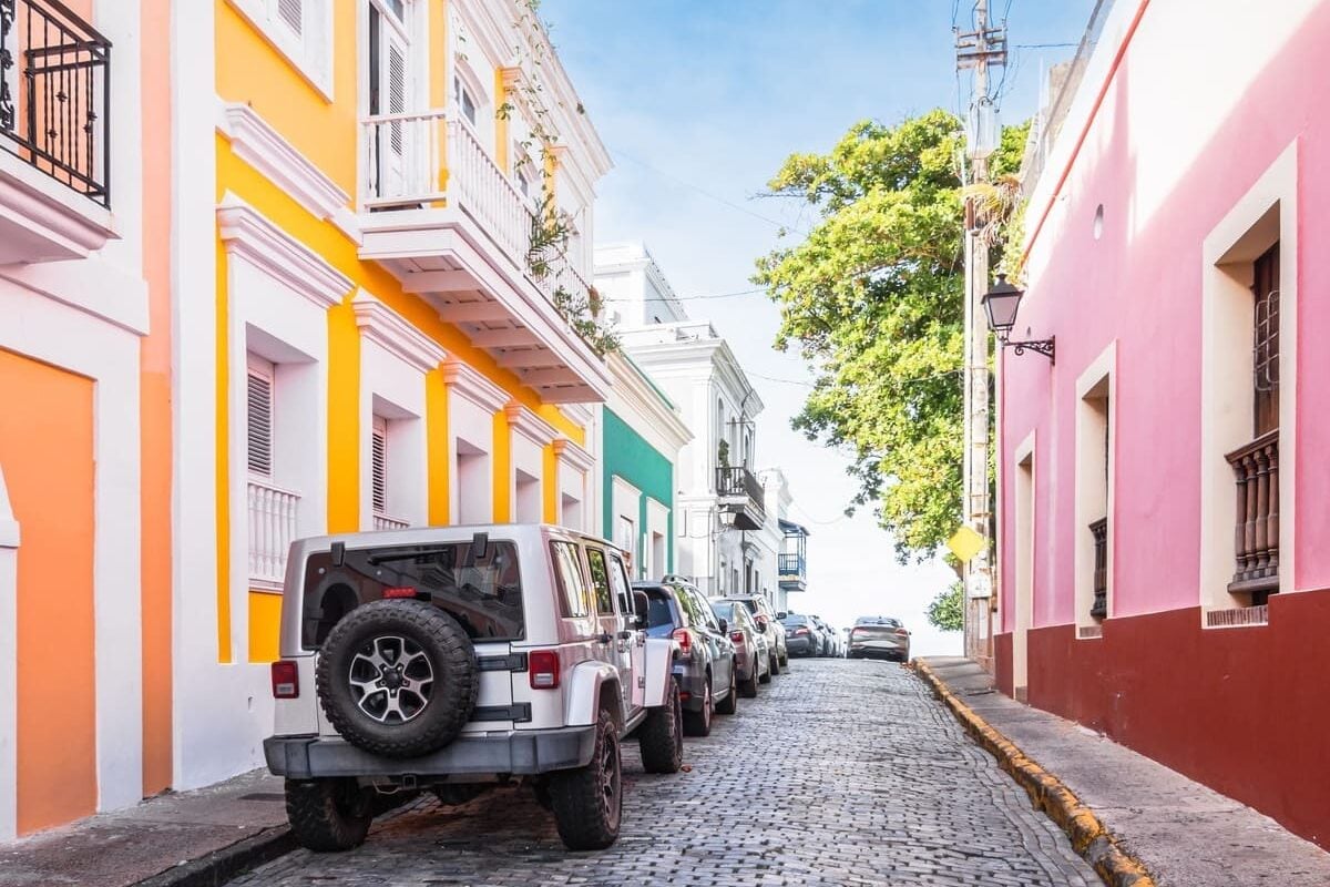 Cobblestone Alley Lined With Colorful Houses In Old San Juan, Puerto Rico