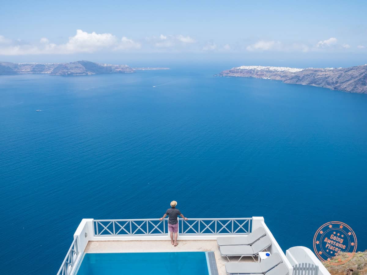 overlooking santorini coast from hotel balcony
