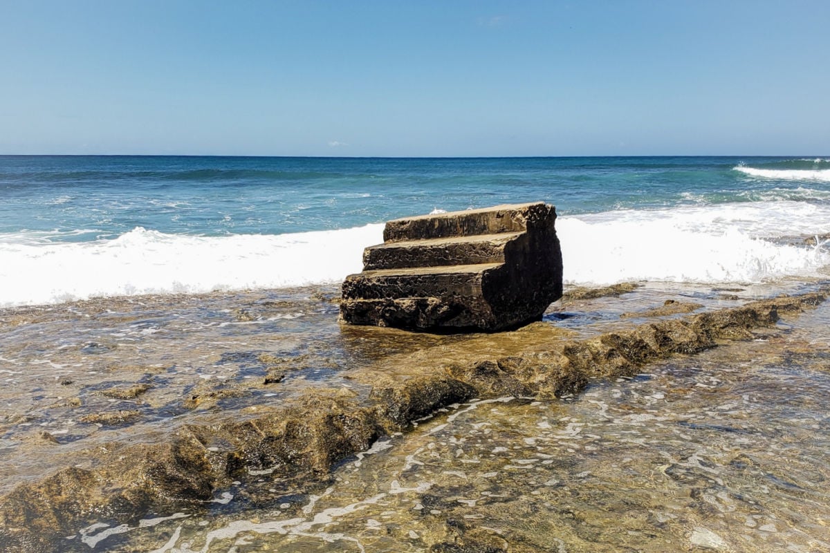 Steps Beach in Rincon, Puerto Rico. Also known as Tres Palmas, it is part of a marine reserve and a popular destination for snorkeling and diving due to its vibrant marine life.