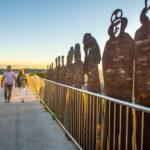 Couple walking along the Newcastle Memorial Walk, The Hill.
