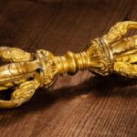 An image of a vajra, or 5-pointed Tibetan sceptre, which is a symbol of indestructibility and also emptiness