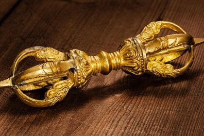 An image of a vajra, or 5-pointed Tibetan sceptre, which is a symbol of indestructibility and also emptiness
