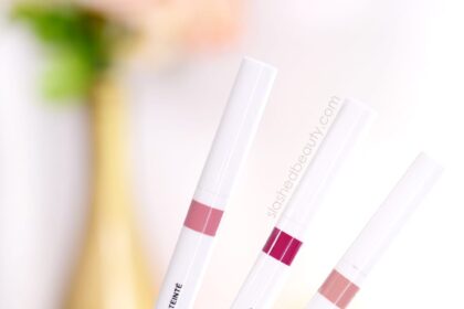 Close up of hand holding three wet n wild Perfect Pout Lip Liner Stains